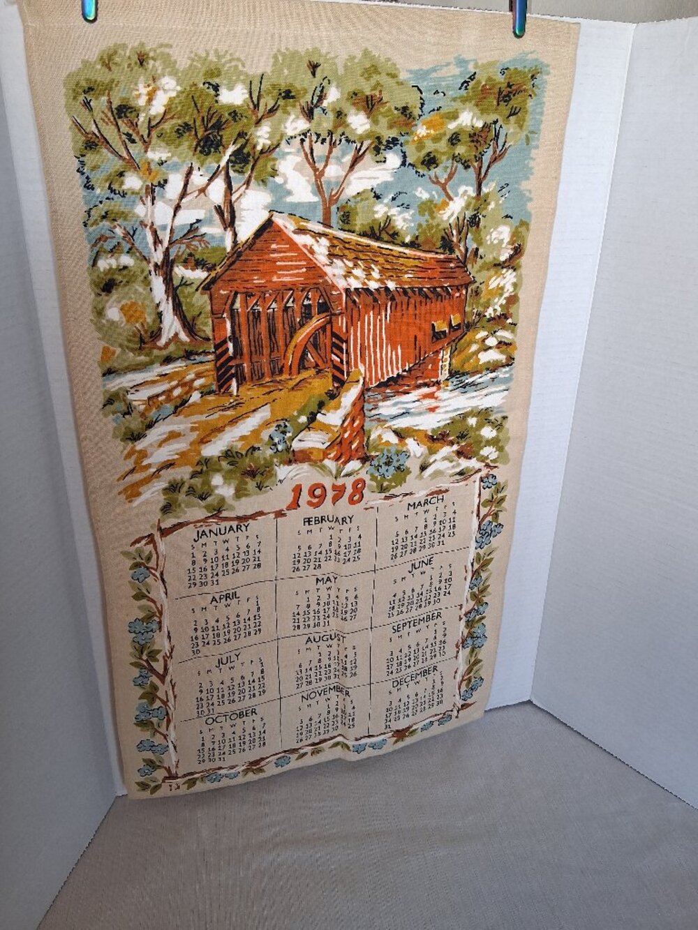 VTG 1978 cotton Linen Calendar Tea Towel Spring floral forest Covered Bridge